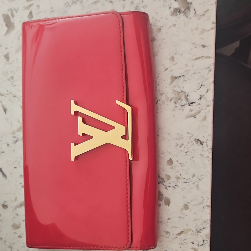 Louis Vuitton Red Clutch with Gold Accents
